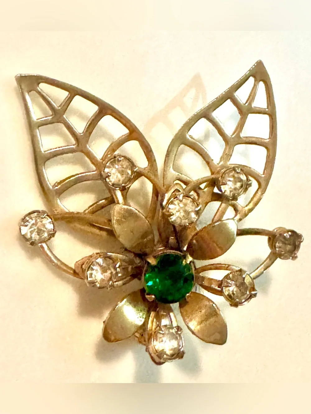 Vintage-Inspired Gold Leaf Floral Brooch with Emerald Center